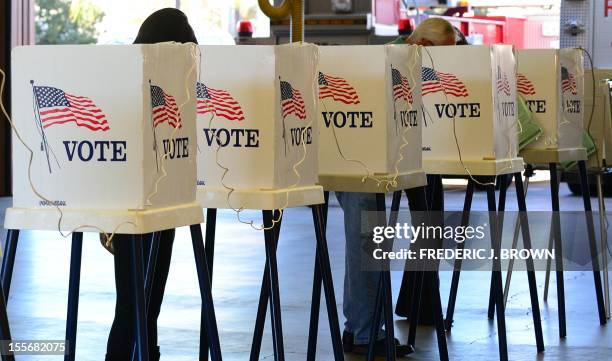 Citizens vote on Election Day at Fire Station in Alhambra, Los Angeles County, on November 6, 2012 in California, as Americans flock to the polls...