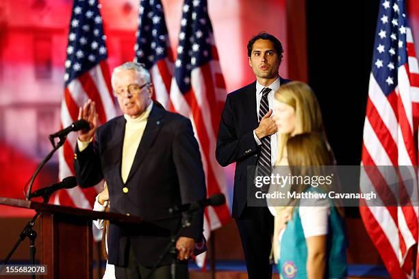 Craig Romney, son of Republican presidential candidate, Mitt Romney, listens to the National Anthem being sung during Mitt Romney's campaign election...