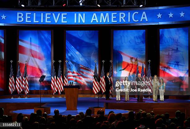 Craig Romney, son of Republican presidential candidate, Mitt Romney, leads the pledge of allegiance with girl scouts during Mitt Romney's campaign...