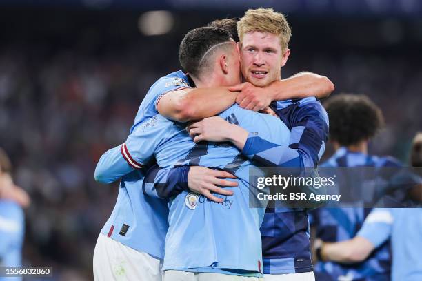 Phil Foden of Manchester City, Kevin De Bruyne celebrating the win during the UEFA Champions League Final match between Manchester City FC and FC...