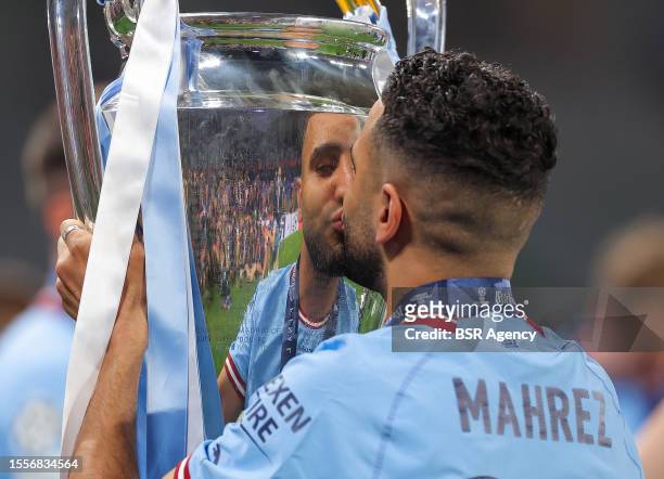 Riyad Mahrez of Manchester City with the cup during the UEFA Champions League Final match between Manchester City FC and FC Internazionale Milano at...