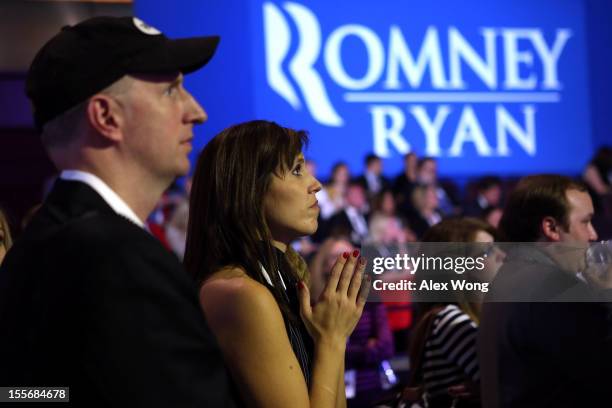 Nancy French, of Columbia, TN, reacts to the election results displayed on a television during Mitt Romney's campaign election night event at the...