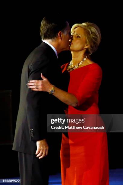 Republican presidential candidate, Mitt Romney, kisses his wife, Ann Romney, after conceding the presidency during Mitt Romney's campaign election...