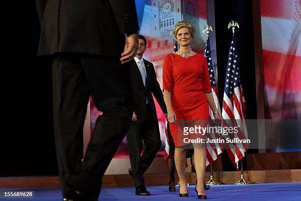 Republican presidential candidate, Mitt Romney is greeted by wife, Ann Romney, Republican vice presidential candidate, U.S. Rep. Paul Ryan , and...