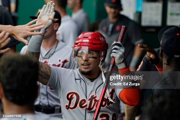 Javier Baez of the Detroit Tigers celebrates his home run with teammates in the second inning against the Kansas City Royals at Kauffman Stadium on...