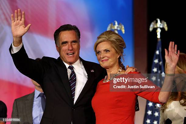 Republican presidential candidate, Mitt Romney, wife, Ann Romney, wave to the crowd on stage after conceding the presidency during Mitt Romney's...