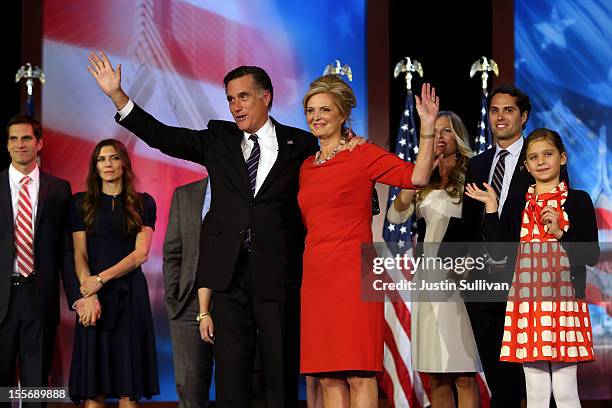 Republican presidential candidate, Mitt Romney, wife, Ann Romney, and family, wave to the crowd on stage after conceding the presidency during Mitt...