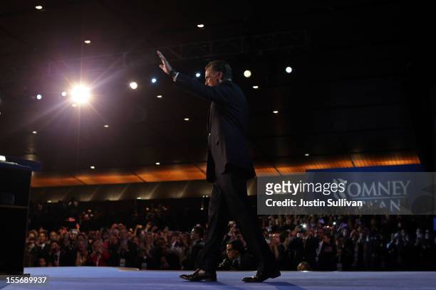 Republican presidential candidate, Mitt Romney, waves to the crowd before conceding the presidency during Mitt Romney's campaign election night event...
