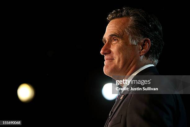 Republican presidential candidate, Mitt Romney, speaks at the podium as he concedes the presidency during Mitt Romney's campaign election night event...