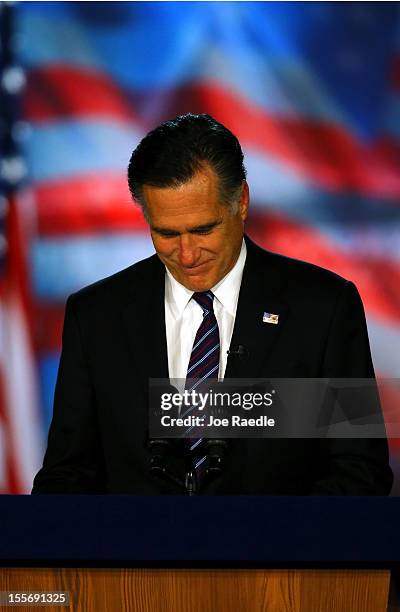 Republican presidential candidate, Mitt Romney, speaks at the podium as he concedes the presidency during Mitt Romney's campaign election night event...