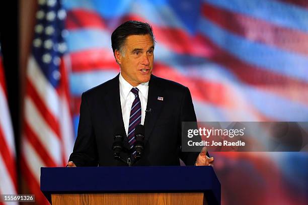 Republican presidential candidate, Mitt Romney, speaks at the podium as he concedes the presidency during Mitt Romney's campaign election night event...