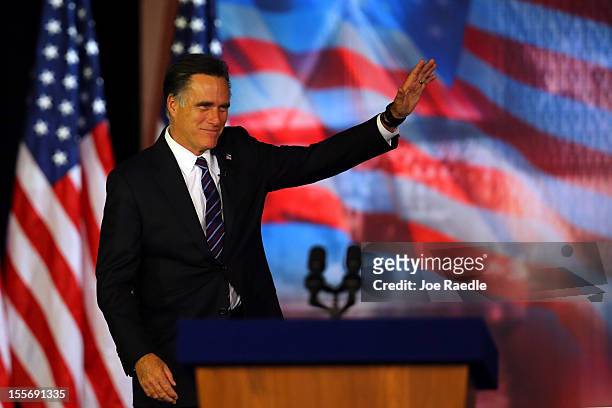 Republican presidential candidate, Mitt Romney, waves to the crowd before conceding the presidency during Mitt Romney's campaign election night event...