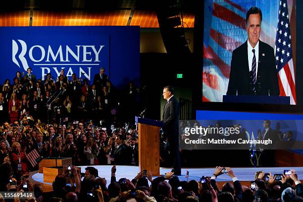 Republican presidential candidate, Mitt Romney, speaks at the podium as he concedes the presidency during Mitt Romney's campaign election night event...
