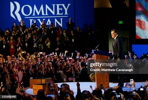 Republican presidential candidate, Mitt Romney, speaks at the podium as he concedes the presidency during Mitt Romney's campaign election night event...