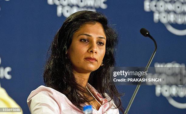 Professor of Economics, Harvard University USA Gita Gopinath listens to a speaker during the World Economic Forum summit in Gurgaon on November 7,...