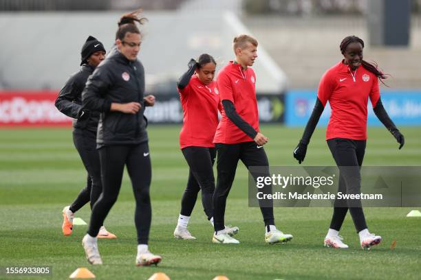 Olivia Smith, Quinn and Simi Awujo warm up during a Canada training session ahead of the FIFA Women's World Cup Australia & New Zealand 2023 at...