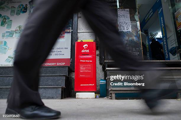 Bharti Airtel Ltd. Payment box sits outside a mobile services store in New Delhi, India, on Tuesday, Nov. 6, 2012. Bharti Airtel, India’s largest...