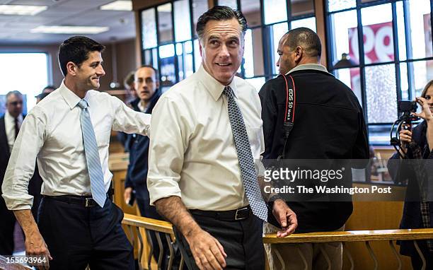 On election day, Republican nominee for President Governor Mitt Romney and Vice Presidential candidate Congressman Paul Ryan stop at a Wendy's for...