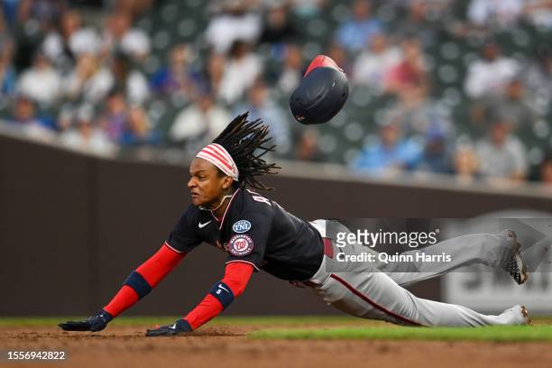 Abrams of the Washington Nationals slides to steal second base in the third inning against the Chicago Cubs at Wrigley Field on July 19, 2023 in...