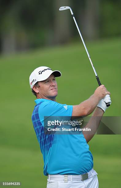 Marcus Fraser of Australia plays a shot during the pro - am prior to the start of the Barclays Singapore Open at the Sentosa Golf Club on November 7,...