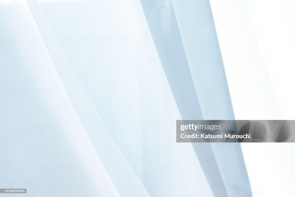Streamlined pattern blue curtain background