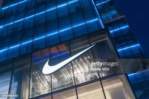 Nike logo is seen on the facade of a Nike Rise Concept Store on July 19, 2023 in Chongqing, China.