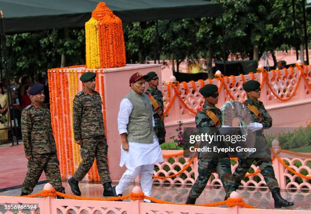 July 26 Drass Kashmir, India : Indian Union Defence Minister Rajnath Singh walks near the war memorial during "Vijay Diwas" celebrations in Drass,...