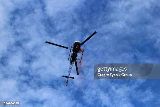 July 26 Drass Kashmir, India : An Indian army helicopter fly over the sky during "Vijay Diwas" or Victory Day celebration in Drass, about 160 km east...