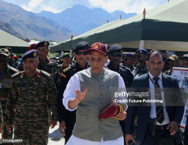 July 26 Drass Kashmir, India : Indian Union Defence Minister Rajnath Singh along with senior Army officer walk near the war memorial during "Vijay...