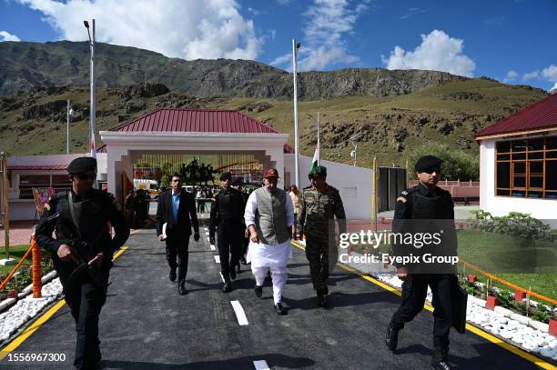 July 26 Drass Kashmir, India : Indian Union Defence Minister Rajnath Singh along with senior Army officer walk near the war memorial during "Vijay...