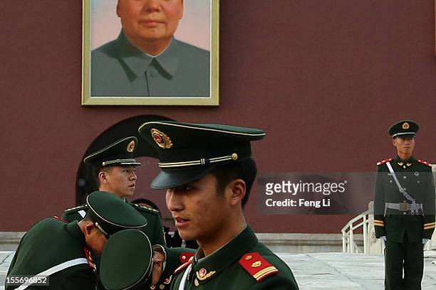 Chinese paramilitary policemen guard in front of the Tiananmen Gate on November 7, 2012 in Beijing, China. The18th National Congress of the Communist...