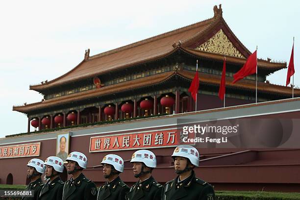 Chinese soldiers guard in front of the Tiananmen Gate on November 7, 2012 in Beijing, China. The18th National Congress of the Communist Party of...