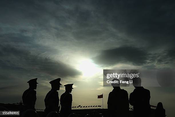 Chinese paramilitary policemen patrol at the Tiananmen Square on November 7, 2012 in Beijing, China. The18th National Congress of the Communist Party...