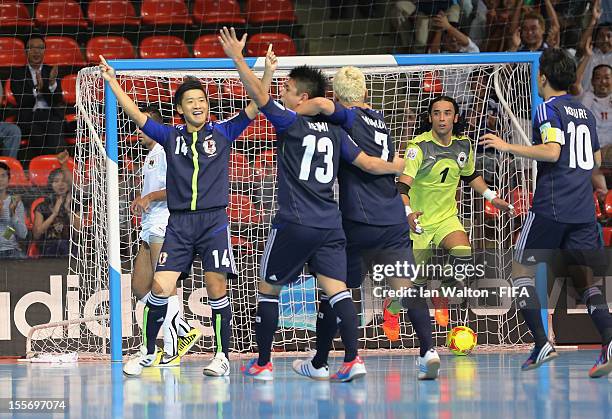 Kotaro Inaba of Japan celebrates scoring the first goal during the FIFA Futsal World Cup Group C match between Japan and Libya at Indoor Stadium...