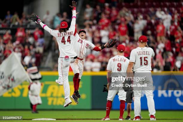 Elly De La Cruz, TJ Friedl, Matt McLain, and Nick Senzel of the Cincinnati Reds celebrate after beating the San Francisco Giants 3-2 at Great...