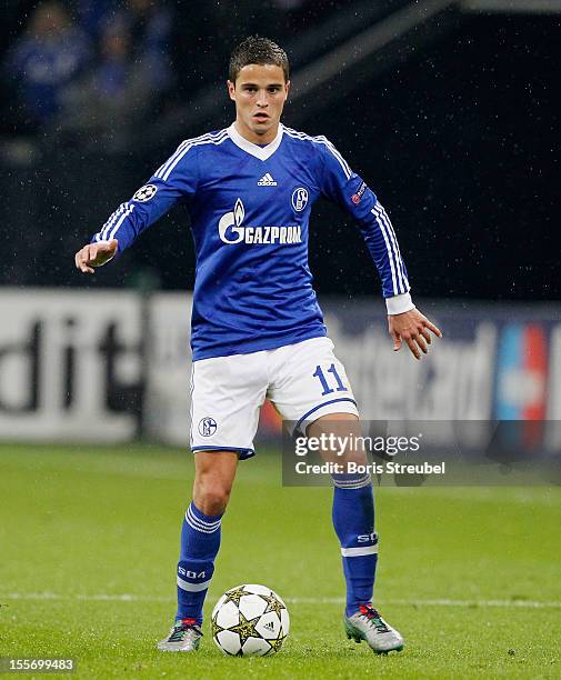 Ibrahim Afellay of Schalke runs with the ball during the UEFA Champions League group B match between FC Schalke 04 and Arsenal FC at Veltins-Arena on...