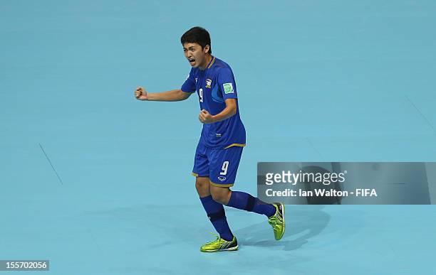 Jirawat Sornwichian of Thailand celebrates scoring a goal during the FIFA Futsal World Cup Group C match between Paraguay and Thailand at Indoor...