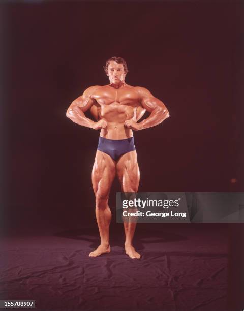 Portrait of Arnold Schwarzenegger posing during photo shoot. Los Angeles, CA 8/22/1974 CREDIT: George Long