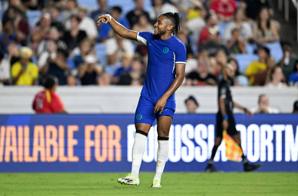 Christopher Nkunku of Chelsea celebrates after scoring their team's fourth goal during the Pre-Season Friendly match between Chelsea FC and Wrexham...