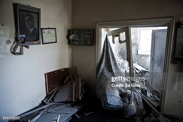 Debris litters an apartment on the front line damaged in recent fighting between positions held by the Free Syrian Army and Syrian Military near the...