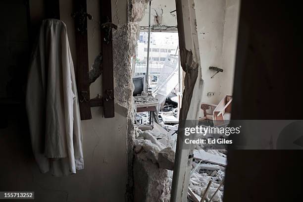 Debris litters an apartment on the front line damaged in recent fighting between positions held by the Free Syrian Army and Syrian Military near the...