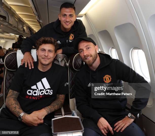 Victor Lindelof, Diogo Dalot, Christian Eriksen of Manchester United checks in ahead of their flight to the USA for their pre-season tour on July 19,...