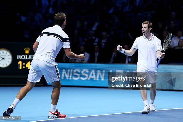 Frederik Nielsen of Denmark and Jonathan Marray of Great Britain celebrate their victory during the men's doubles match against Max Mirnyi of Belarus...