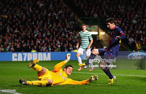 Celtic goalkeeper Fraser Forster denys Barcelona player Lionel Messi during the UEFA Champions League Group G match between Celtic and Barcelona at...