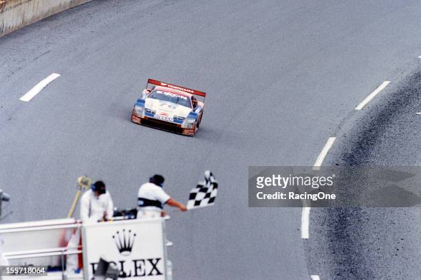 February 6, 1994: The checkered flag falls at Daytona International Speedway as the Nissan 300ZX of Scott Pruett, Butch Leitzinger, Paul Gentilozzi...