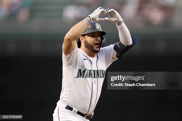 Eugenio Suarez of the Seattle Mariners celebrates his two run home run against the Minnesota Twins during the seventh inning at T-Mobile Park on July...