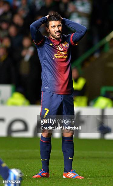 David Villa of Barcelona reacts during the UEFA Champions League Group G match between Celtic and Barcelona at Celtic Park on November 7, 2012 in...