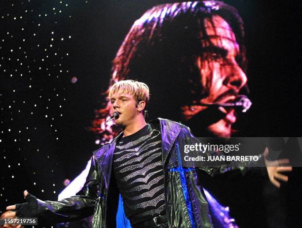 Backstreet Boys' Brian Thomas sings during a 12 May concert in Caracas. The group is on a tour of Latin America. AFP PHOTO/Juan BARRETO