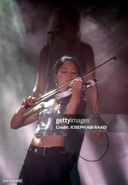 World famous violinist Vanessa Mae performs at Oceana beach club in Rmayleh, South of Beirut, late 21 August 2001. Vanessa sang and played selections...