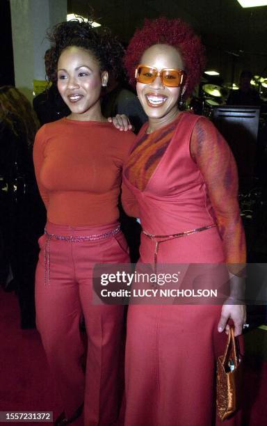 Erica and Tina Atkins of the R&B music group MARY MARY arrive backstage at the 28th Annual American Music Awards 08 January 2001 in Los Angeles, CA....